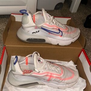 white pink and blue nike air max shoes